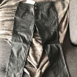 Black jeans with faux leather-like texture